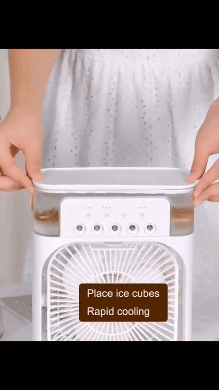 White electronic device with text 'Place ice cubes Rapid cooling' held by a person wearing a white dress.